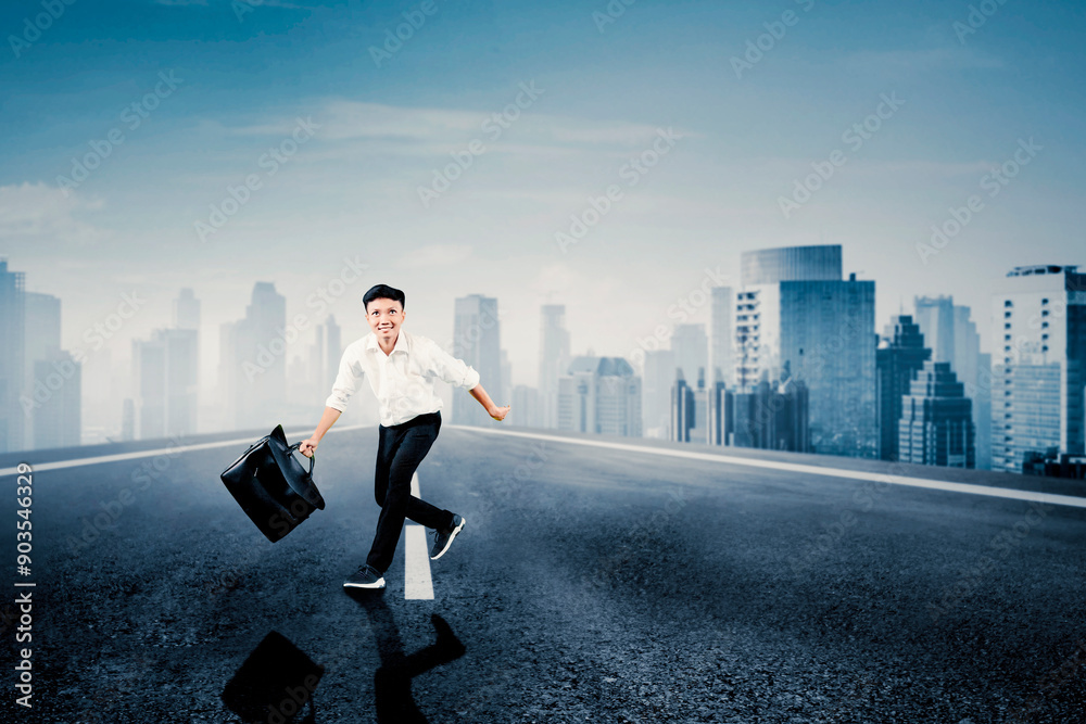 Business in action with running businessman in a road Business in action with running businessman in a road
