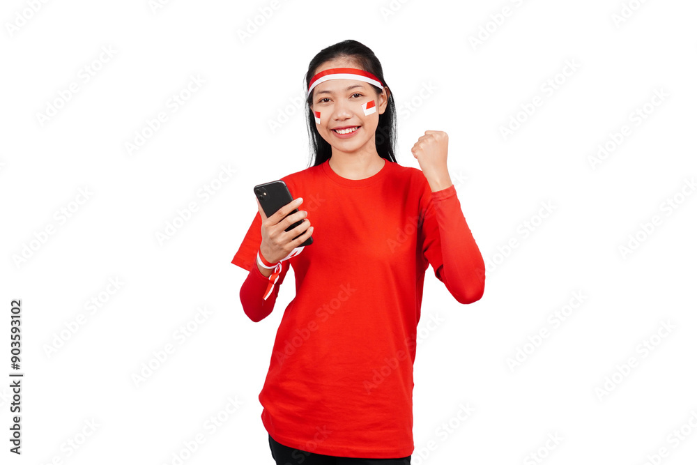 An Indonesian woman celebrating Indonesia's independence day on 17 August while holding smartphone with blank screen isolated transparent An Indonesian woman celebrating Indonesia's independence day on 17 August while holding smartphone with blank screen isolated transparent