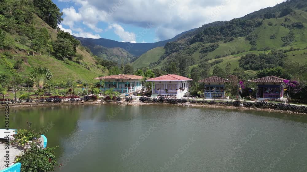 Low flyover of lago to hotel cabanas above Jardin Valley, Colombia Low flyover of lago to hotel cabanas above Jardin Valley, Colombia