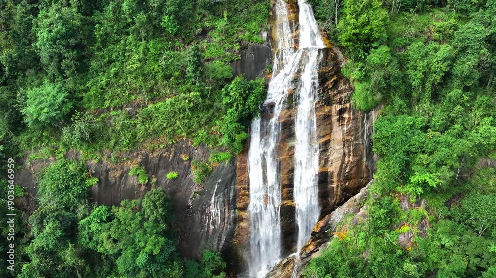 Top view of a sprawling Waterfall , nestled within the dense greenery of a tropical forest at Doi Inthanon National Park, Chiang Mai Province, Thailand 4K Aerial view footage.
Top view of a sprawling Waterfall , nestled within the dense greenery of a tropical forest at Doi Inthanon National Park, Chiang Mai Province, Thailand 4K Aerial view footage.