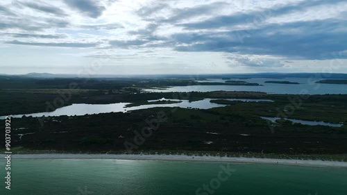 Studland Naturist Beach and Knoll Beach Studland over Studland and Godlingston Heath National Nature Reserve from a drone, Studland, Poole, Dorset, England photo