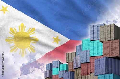 Philippines flag and big stack of shipping cargo containers in docks with sky background close up photo