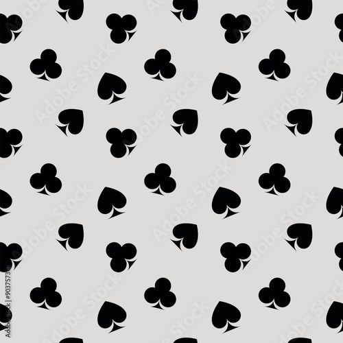 Pattern of playing card suits in modern style on gray background. Abstract vector illustration graphic design.