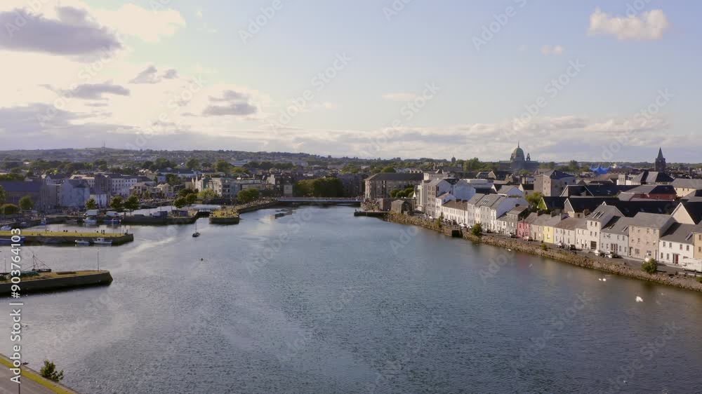 Aerial pullback showcasing the River Corrib, Galway’s iconic Long Walk, and Claddagh on a sunny day Aerial pullback showcasing the River Corrib, Galway’s iconic Long Walk, and Claddagh on a sunny day