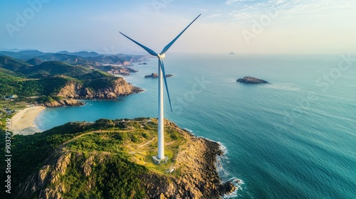 In Bac Lieu, Vietnam, a seascape featuring wind turbines producing electricity is seen alongside a windmill for the production of green energy. Concept of clean energy photo