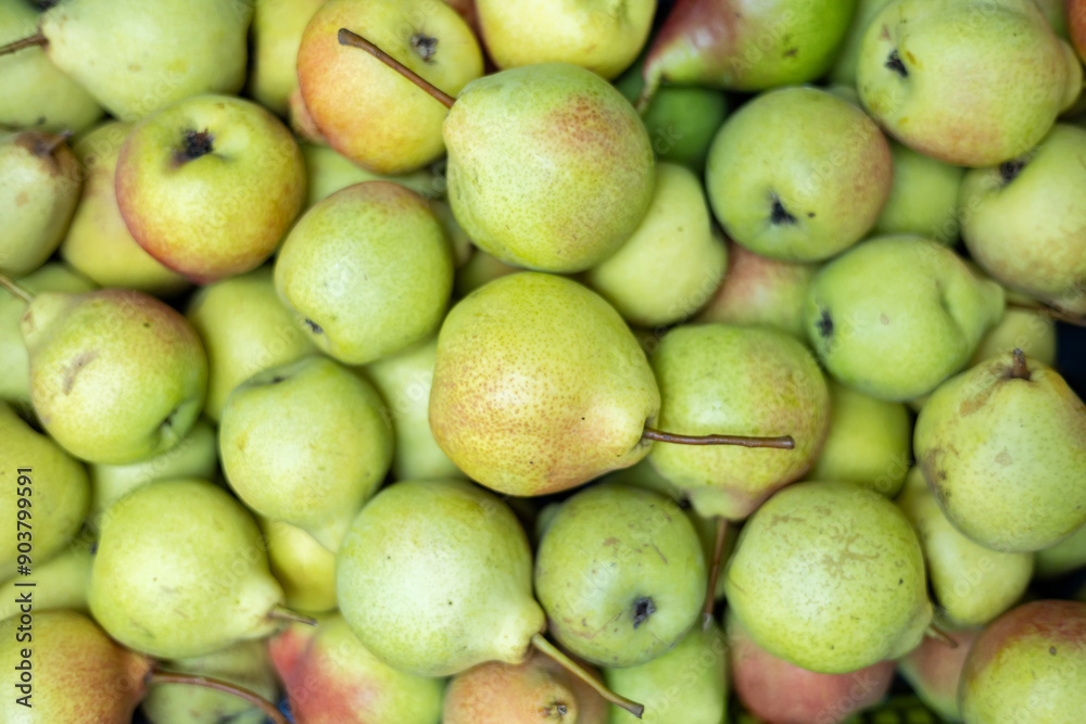 fresh ripe pears as background, top view