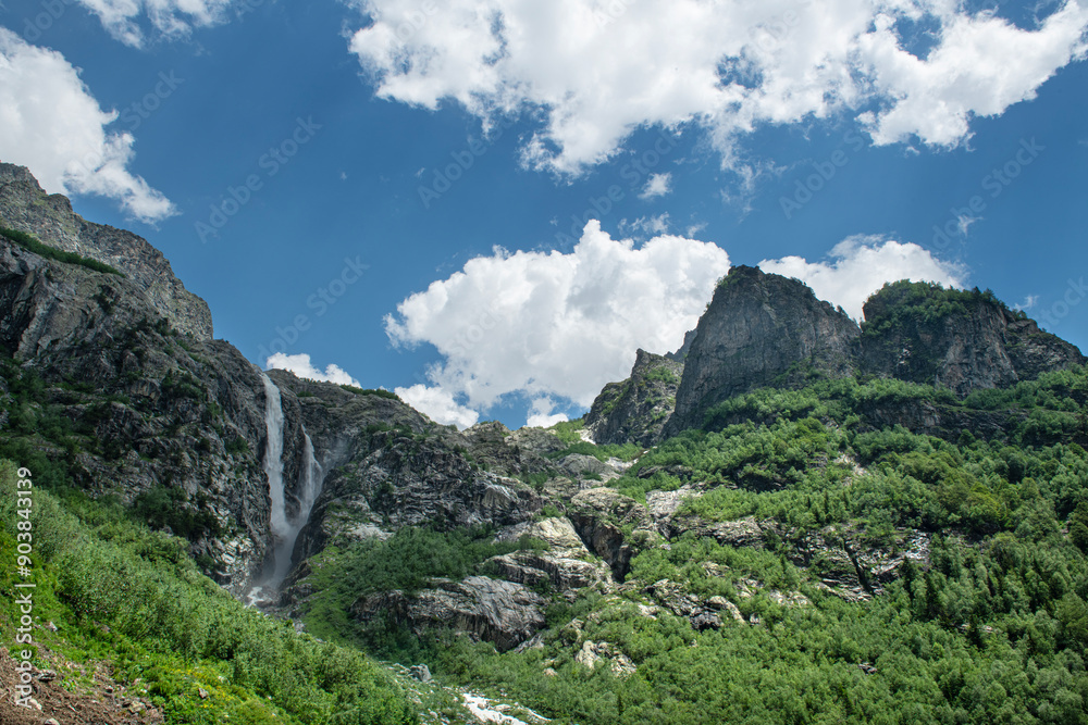 Obraz premium Shdugra waterfall with neighbour waterfalls near Village Mazeri, Svaneti. Expedition in Forest nearby Ushba Mountain.Shdugra waterfall near Mazeri, Georgia. 