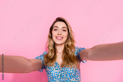 Photo portrait of pretty young girl take selfie photo wear trendy blue flower print outfit isolated on pink color background