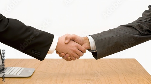 Business Professionals Shaking Hands in a Modern Office Setting During Daytime