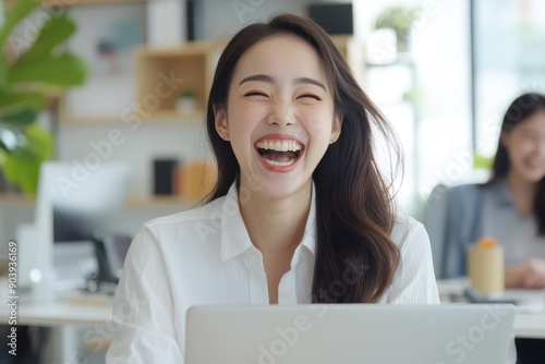 Wallpaper Mural Korean business woman happy working using laptop at office workplace Torontodigital.ca