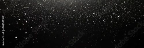 small white particles on  Black background , Small white dust particles floating  in air