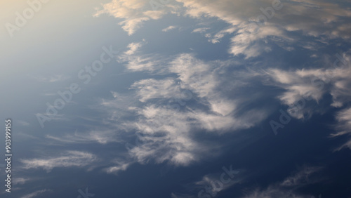 Decorative clouds. Dramatic sky. Natural natural cloud landscape. Soft sunlight. White fluffy clouds on blue sky, texture, background, design, copy space. Meteorology, heaven, hope, peace concept