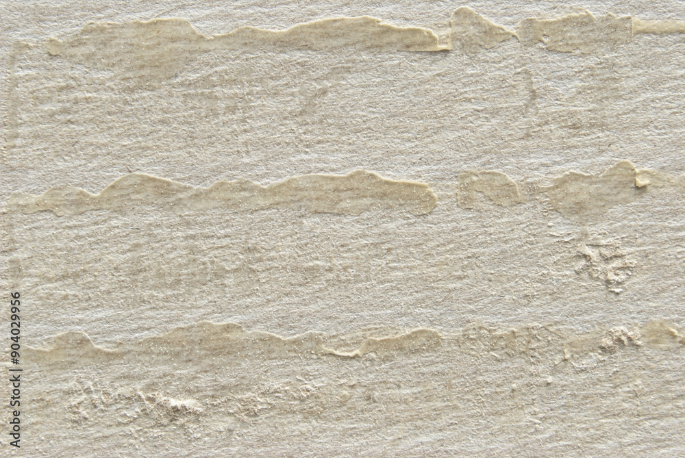 A sheet of rough gray glued unstuck cardboard box texture as background A sheet of rough gray glued unstuck cardboard box texture as background