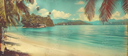 Fototapeta Naklejka Na Ścianę i Meble -  Vintage postcard featuring a scenic tropical beach with clear blue waters and palm trees perfect for use as a background in design projects needing copy space image