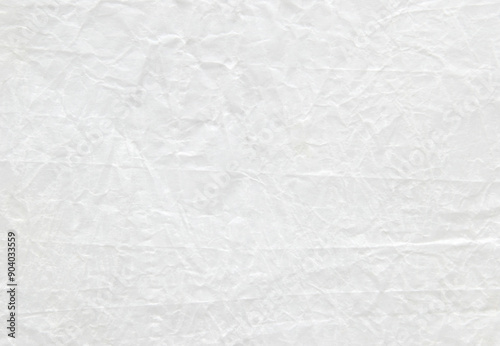 White subtle glossy crumpled paper texture as background