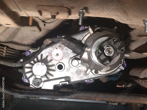 Transfer Case on a 1990s SUV with Purple Painted Accent Bolts photo