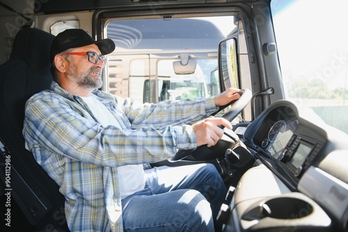 Professional Semi Truck Driver Behind the Wheel of a Classic Truck