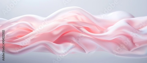 A soft pink silk fabric gracefully drapes and flows, creating a serene and elegant visual effect.