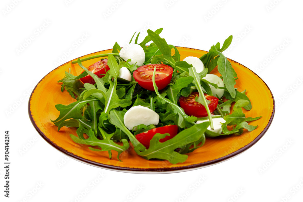 Simple salad of arugula tomatoes and cheese on an orange plate isolated on white