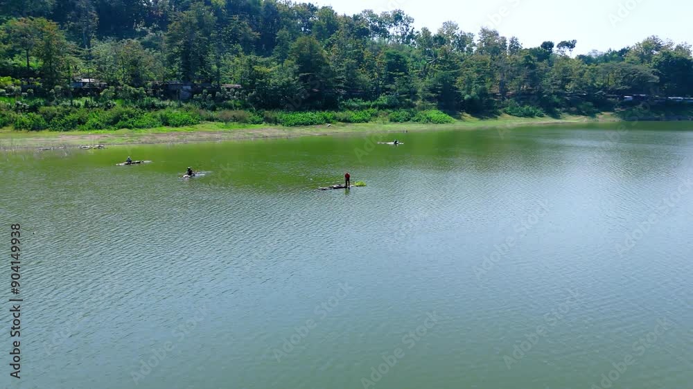Drone shot of fisherman on Gunungrowo reservoir, Pati Indonesia Drone shot of fisherman on Gunungrowo reservoir, Pati Indonesia