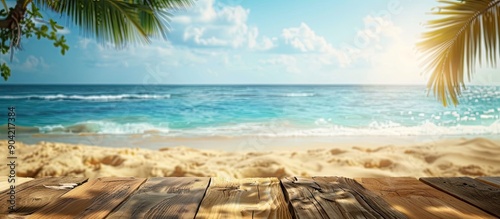 Fototapeta Naklejka Na Ścianę i Meble -  A table set against a blurred summer beach backdrop creates an ideal summer themed copy space image for product display and advertising presentations