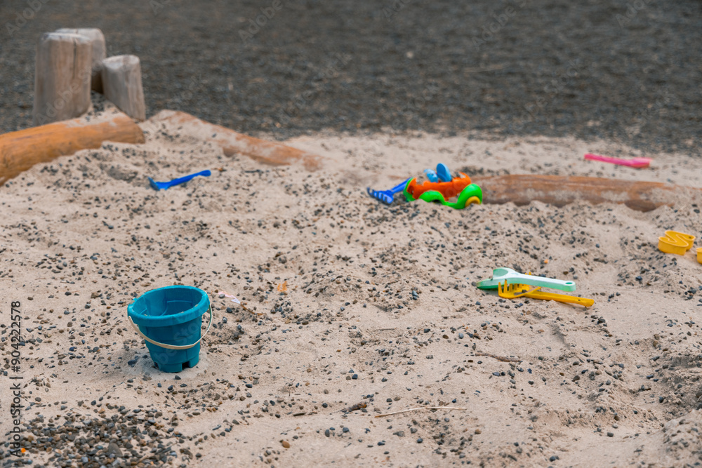 children playground plastic toys backet and car on sand outdoor space for kids children playground plastic toys backet and car on sand outdoor space for kids