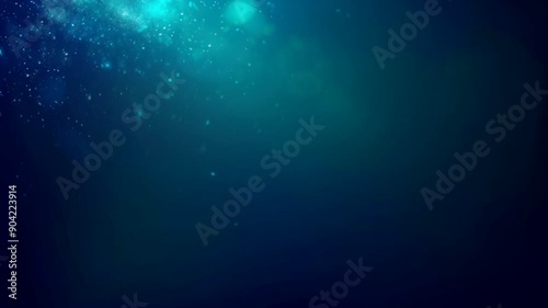 Abstract blue and green bokeh background with copy space.