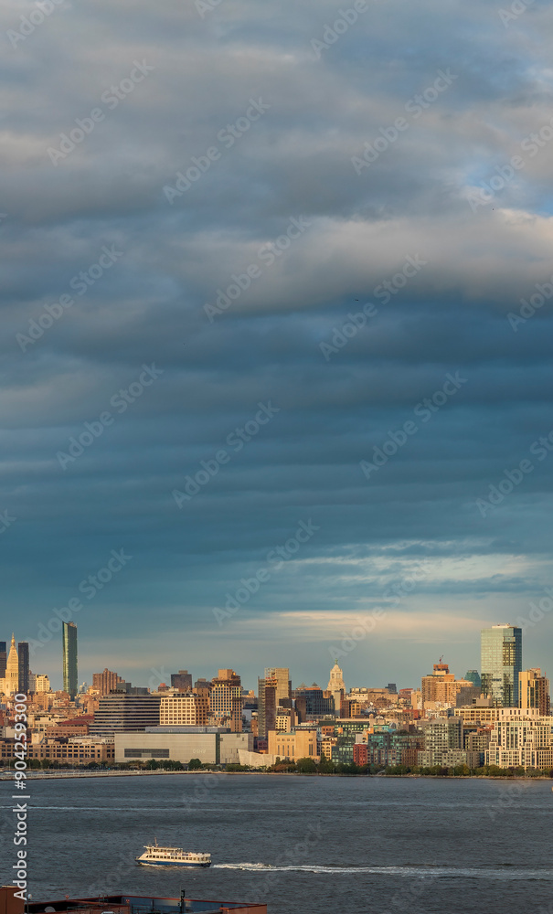 View from New Jersey to the Manhattan skyline at sunset, New York, USA. View from New Jersey to the Manhattan skyline at sunset, New York, USA.