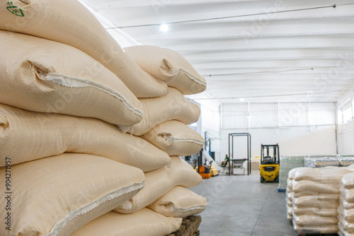 Stacks with sacks full of grain ready to be transported. Images from inside an industrial grain mill.