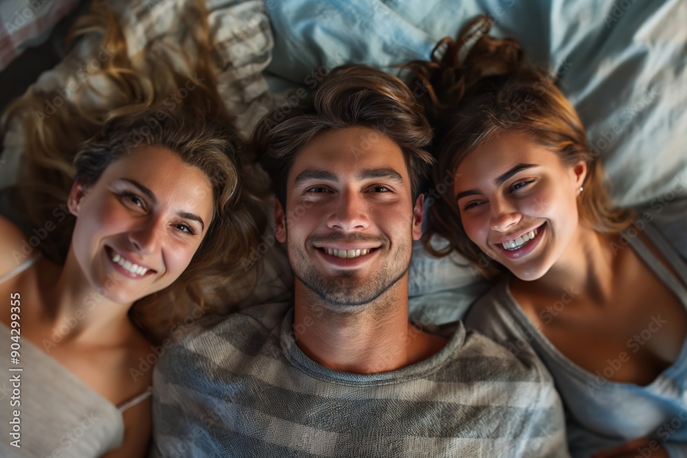 Polyamorous Friends Relaxing Together in Bed Polyamorous Friends Relaxing Together in Bed
