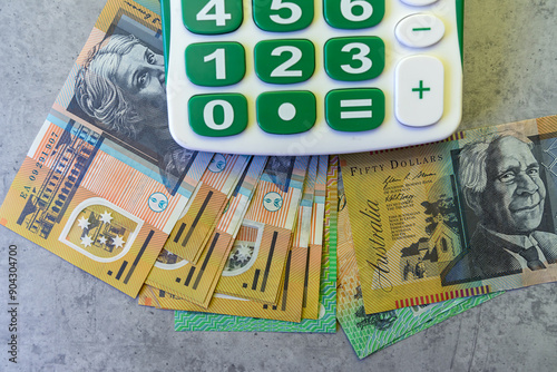 Australian dollars aud money with calculator, financial and investment concepts photo