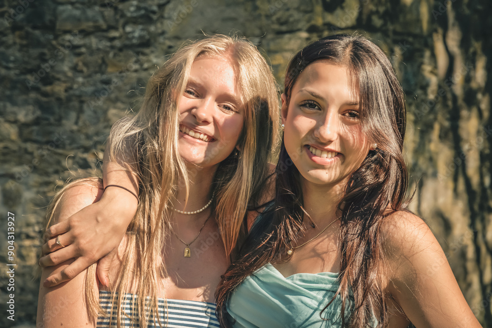 Two teenage girlfriends on a sunny summer afternoon Two teenage girlfriends on a sunny summer afternoon