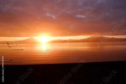 Dramatic sunrise over Lake Llanquihue in the Chilean Lake District in the winter photo