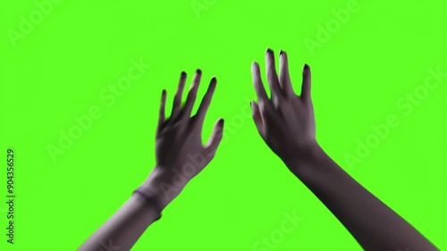 Female Hands Raising and Moving Against Green Background. Close Up. You can replace green screen with the footage or picture you want with “Keying” effect in AF FXs (Check YouTube for tutorials).  4K. photo