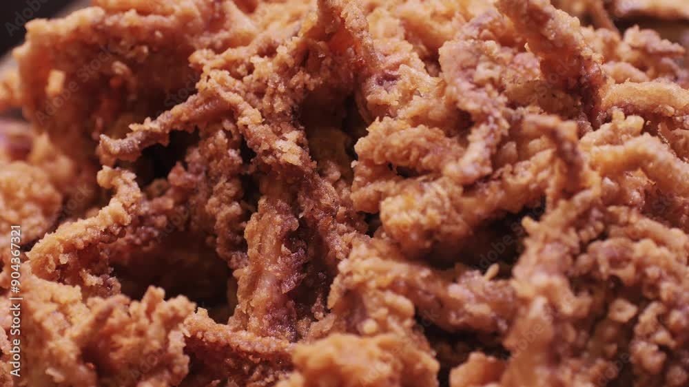 A CloseUp View of Crispy Fried Chicken that Looks Absolutely Delicious and Appetizing A CloseUp View of Crispy Fried Chicken that Looks Absolutely Delicious and Appetizing