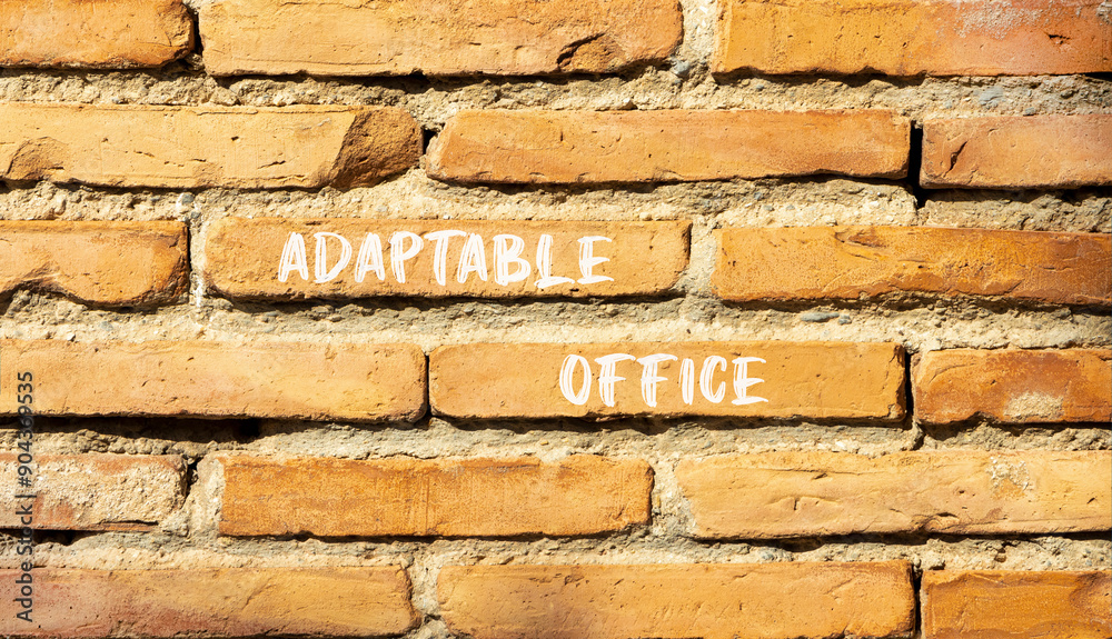 Adaptable office symbol. Concept words Adaptable office on beautiful brick wall. Beautiful red brown brick wall background. Business Adaptable office concept. Copy space. Adaptable office symbol. Concept words Adaptable office on beautiful brick wall. Beautiful red brown brick wall background. Business Adaptable office concept. Copy space.