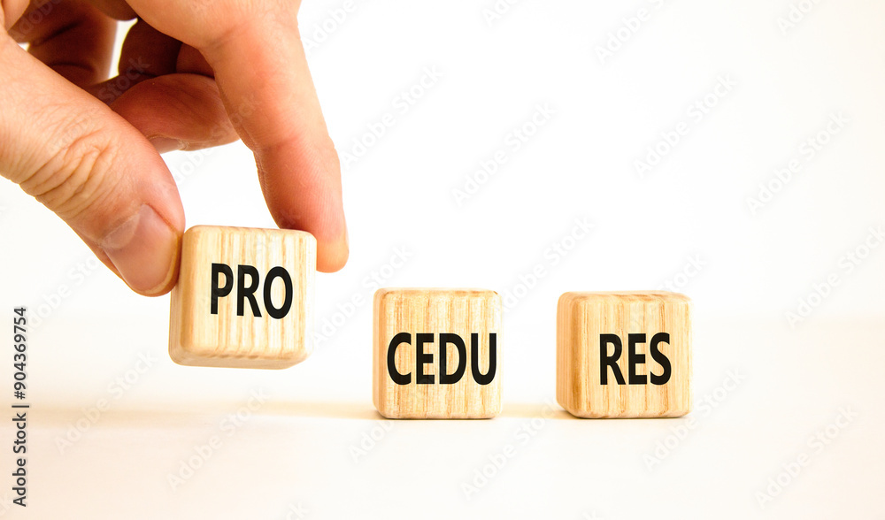 Procedures symbol. Concept word Procedures on beautiful wooden blocks. Businessman hand. Beautiful white background. Business procedures concept. Copy space.