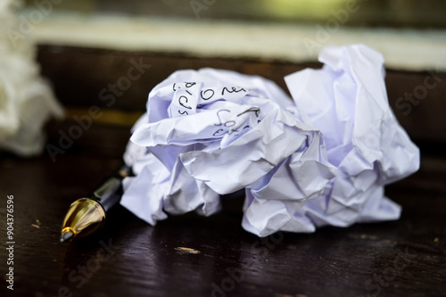 white crumpled paper ball with specular