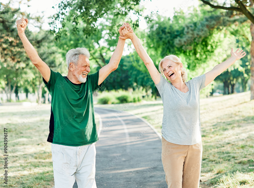 Obraz premium outdoor senior fitness woman man lifestyle active sport exercise healthy fit couple running jogging elderly mature having fun laughing talking together friend hug break