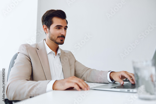 Businessman man technology winner business suit occupation job office laptop happy