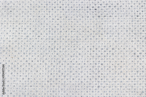 Texture of the reverse side of gray terry cloth. Fabric background.