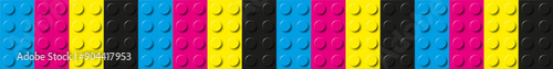 Many plastic building toy blocks banner in cmyk colors. Background of bricks in different colors. Close-up of a colorful bricks. Abstract vector background illustration