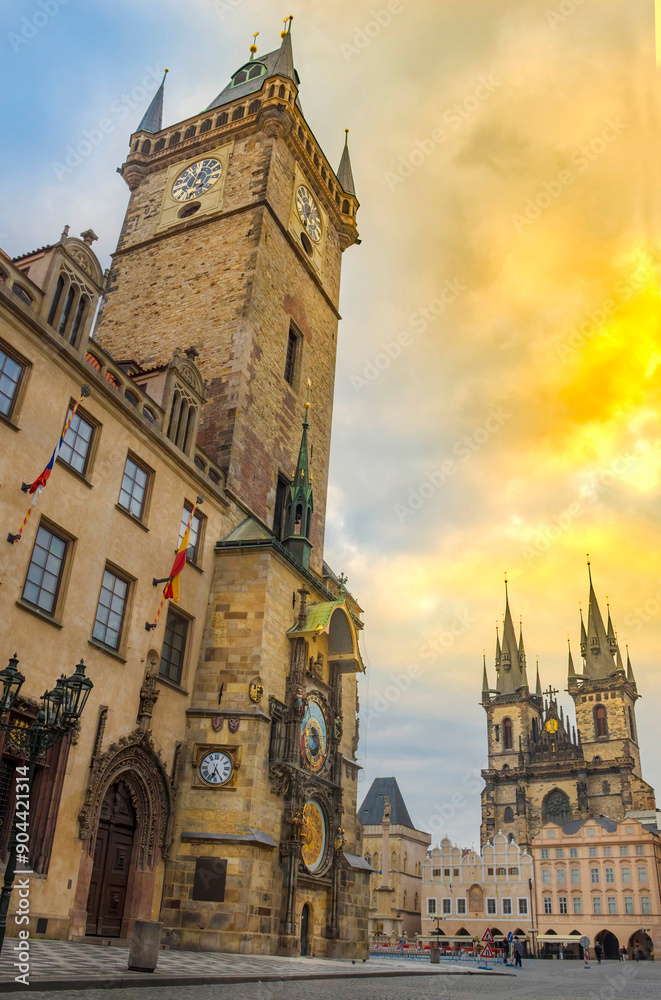 Naklejka premium Beautiful Old Town Square with Church of our Lady Tyn and medieval astronomical clock on the Old Town Hall Tower, in Prague, Czech Republic, at sunrise