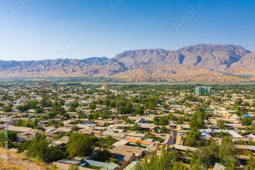 Cityscape of Panjakent with the Zerafshan mountains on the background,  city in Tajikistan photo