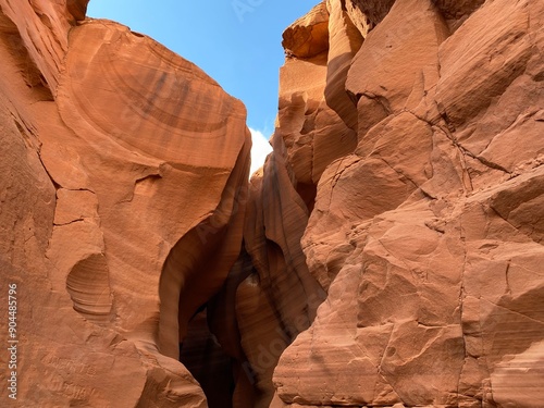 Photo of rear entrance of  Navajo Upper Antelope Canyon within Lake Powell Navajo Tribal Park near Page, east of Lechee, Arizona, United States of America USA.