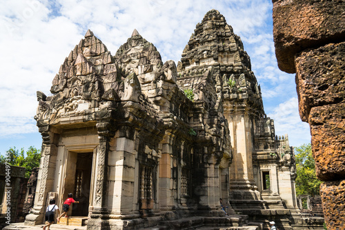 Ruins of Prasat Phimai (Phimai Historical Park) in eastern Thailand, a popular tourist destination in Isan region, Nakhon Ratchasima province, two children in the foreground