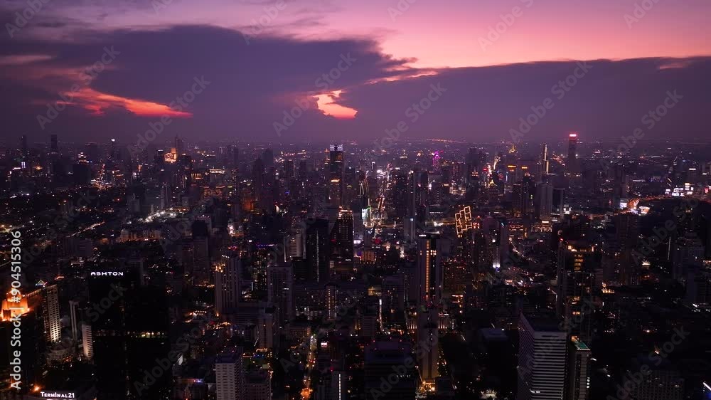 Modern cityscape with high-rise buildings at sunset. Aerial view of a big city skyscrapers buildings skyline. Modern cityscape with high-rise buildings at sunset. Aerial view of a big city skyscrapers buildings skyline.