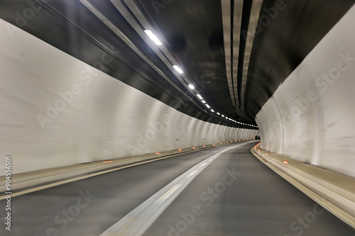 perspective view of deserted highway long tunnel deliberated motion blur
