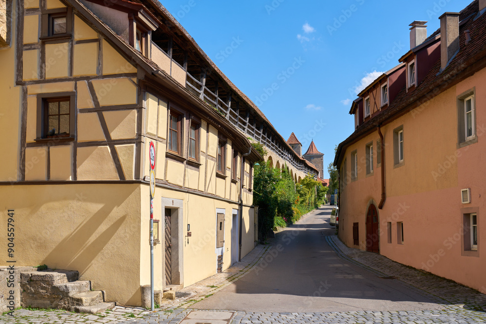 Rothenburg ob der Tauber Narrow Street. A narrow street in the heritage city of Rothenburg ob der Tauber, Germany.
Rothenburg ob der Tauber Narrow Street. A narrow street in the heritage city of Rothenburg ob der Tauber, Germany.