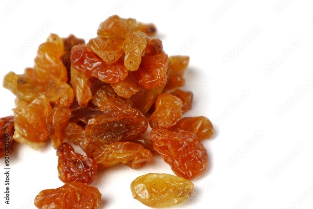 close up of raisins isolated on white close up of raisins isolated on white